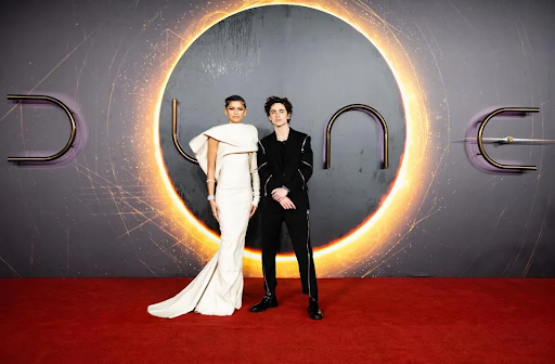 Zendaya and Timothée Chalamet Posing for Pictures on the red carpet.